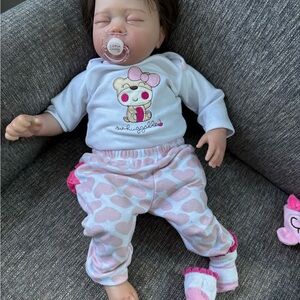 Realistic  Baby Doll with Pink Heart Outfit